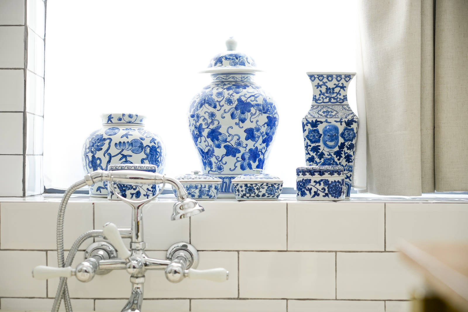 Blue ceramic vessels photographed inside Hotel Les Nuits